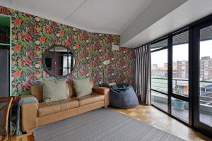 Posezení v ubytování Charming 2-Bedroom Central Green Point Stadium