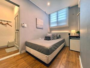 Posteľ alebo postele v izbe v ubytovaní OYO Hostel Dongdaemun1