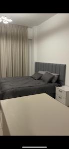Ένα ή περισσότερα κρεβάτια σε δωμάτιο στο Al Raha chalet -al raha village -marsa zayed - قرية الراحة العقبة -مرسى زايد
