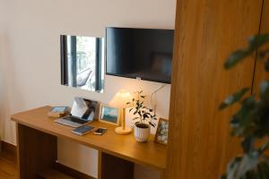 TV a/nebo společenská místnost v ubytování Anita homestay Dalat