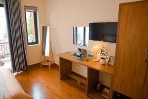 TV a/nebo společenská místnost v ubytování Anita homestay Dalat