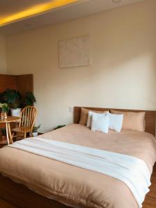 Postel nebo postele na pokoji v ubytování Anita homestay Dalat