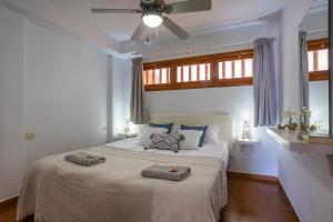 Ένα ή περισσότερα κρεβάτια σε δωμάτιο στο Garden City Private Apartment Costa Adeje +27 φωτογραφίες