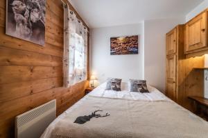 Posteľ alebo postele v izbe v ubytovaní Appart Cosy 3 étoiles