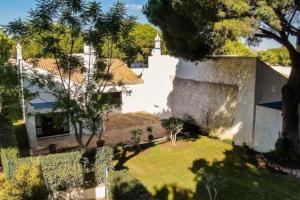 an aerial view of a house with a yard at Casa Calma in Albufeira