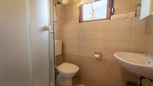 Ein Badezimmer in der Unterkunft Guest house Donna