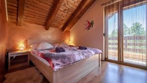 Ein Bett oder Betten in einem Zimmer der Unterkunft Guest house Donna