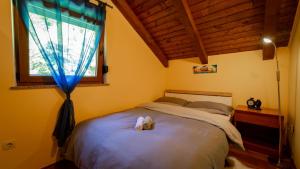 Ein Bett oder Betten in einem Zimmer der Unterkunft Guest house Donna