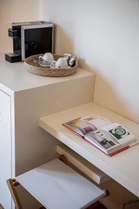 TV a/nebo společenská místnost v ubytování Faedra Residence