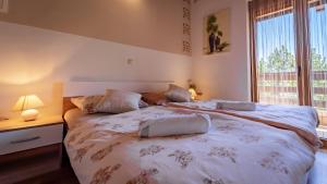 Ein Bett oder Betten in einem Zimmer der Unterkunft Guest house Donna