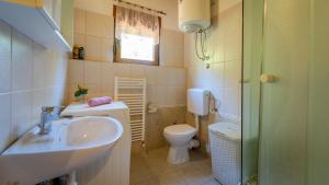 Ein Badezimmer in der Unterkunft Guest house Donna