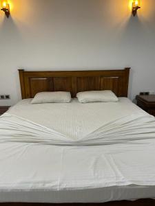 Una cama o camas en una habitación de Blue Ocean Residence