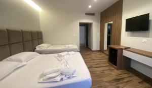 Postel nebo postele na pokoji v ubytování Hotel Miami Beach