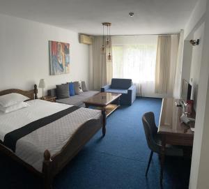 Postel nebo postele na pokoji v ubytování Hotel Rotasar