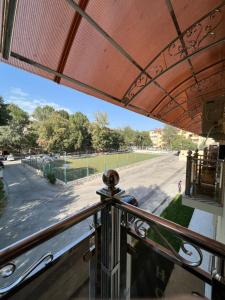 a balcony with a view of a street at Diplomat Premium Hotel in Samarkand