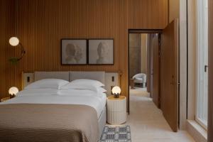Postel nebo postele na pokoji v ubytování Six Senses Rome