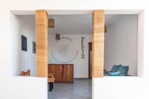 a view of a living room with a white wall at S&S HOTEL in Jambiani