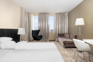 Krevet ili kreveti u jedinici u okviru objekta Falkensteiner Hotel Belgrade Superior