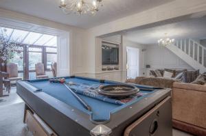 a living room with a pool table in it at Angel Cottage - 3 Bedroom Cottage - Stepaside in Stepaside