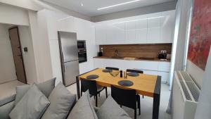 Kuchyň nebo kuchyňský kout v ubytování Luxury Apartment Stella