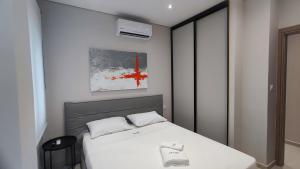 Postel nebo postele na pokoji v ubytování Luxury Apartment Stella