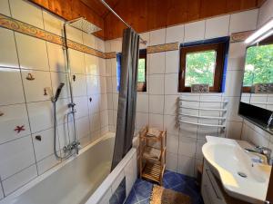 Koupelna v ubytování Haus Susi + 25 fotografií