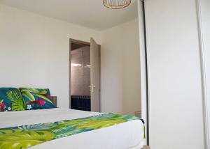 Postel nebo postele na pokoji v ubytování Appartement équipé avec vue et place de parking