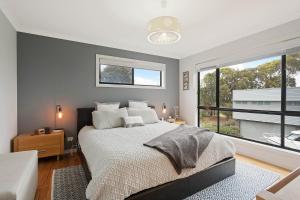 Una cama o camas en una habitación de Plan Beach