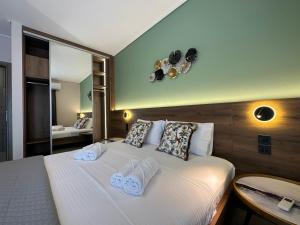 Gulta vai gultas numurā naktsmītnē Top Line & Modern Apartments in Ioannina
