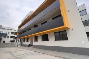 a large building with a lot of windows at 2 room Apartment Rovinka, 204 in Rovinka