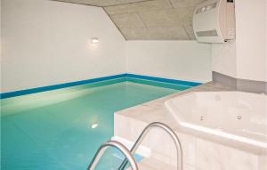 Bazén v ubytování Amazing Home In Oksbl With Indoor Swimming Pool nebo v jeho okolí