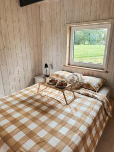 Postel nebo postele na pokoji v ubytování Sunset Village