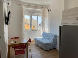 Posedenie v ubytovaní Appartamento Corallo