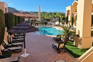 Bazén v ubytování Luxury apartment at Baia da Luz Resort nebo v jeho okolí