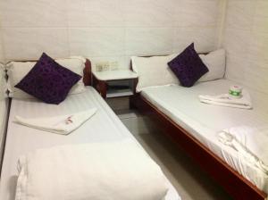Letto o letti in una camera di Reliance Inn