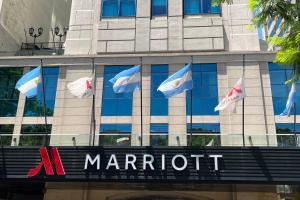 a marriott sign in front of a building with flags at Marriott Buenos Aires Downtown in Buenos Aires