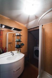 a bathroom with a sink and a shower at Ferienwohnung Zedlacher in Kartitsch +28 photos