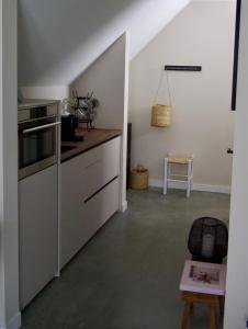 Kuchyňa alebo kuchynka v ubytovaní La Vita Veluwe