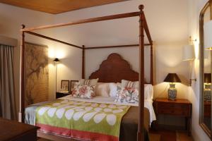 Postel nebo postele na pokoji v ubytování Casas Do Coro