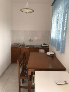 Kuchyň nebo kuchyňský kout v ubytování Diomare Villas