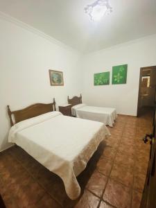 Postel nebo postele na pokoji v ubytování VFT Las Piedrecitas