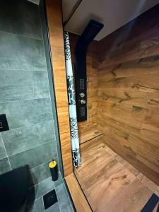 an inside view of a sauna with a wooden wall at Sevi House Suite in Thessaloniki