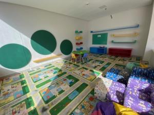 a room with a classroom with toys on the floor at Park Veredas in Rio Quente