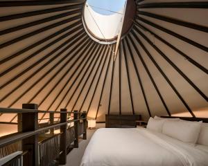 Patamma Hideaway Resort客房内的一张或多张床位