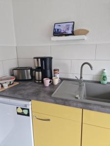 Kuchyň nebo kuchyňský kout v ubytování Ferienwohnung Relax