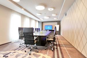 TV i/ili multimedijalni sistem u objektu Falkensteiner Hotel Belgrade Superior