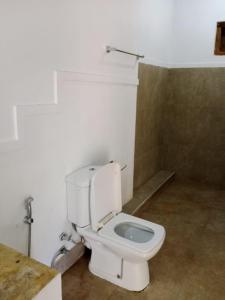 Ett badrum på Sigiri Access Villa & Restaurant