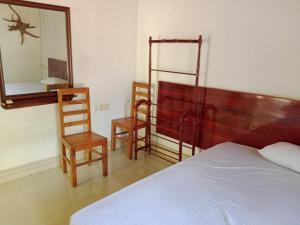 Cama o camas de una habitación en Sigiri Access Villa & Restaurant