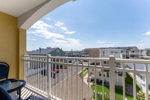 a balcony with a view of a street at Nw Condo W Private Balcony & Pool in North Wildwood