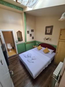Postel nebo postele na pokoji v ubytování Guesthouse Yildiz